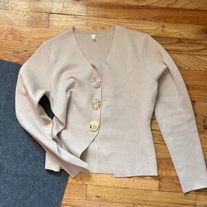 Elegant Beige Women's Sweater with Unique Button Design